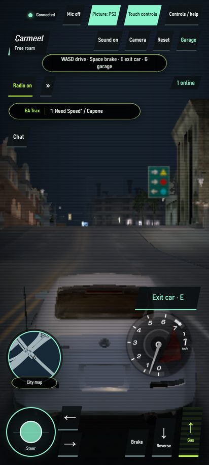 Carmeet on a phone, driving with the touch controls