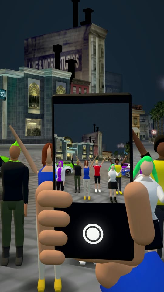 The in-game phone raised to photograph the crowd